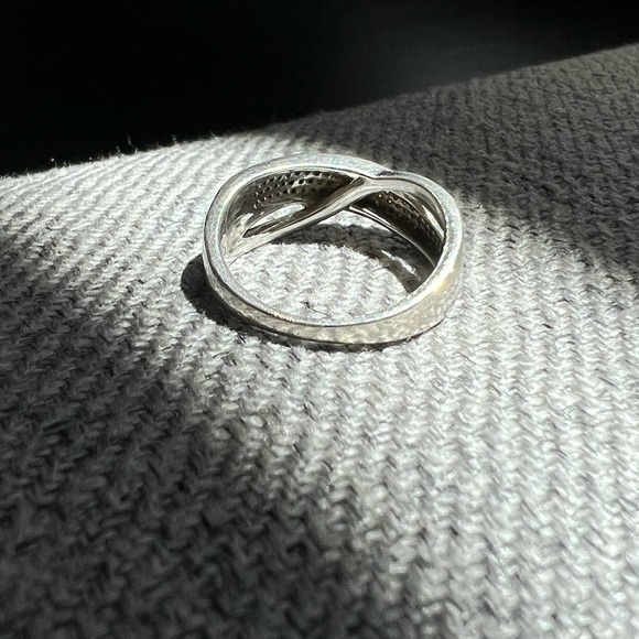 1/10 CT. T.W. Diamond Multi-Row Crossover Anniversary Band in Sterling Silver - Picture 3 of 7